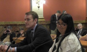 Mark Reece, associate director of the Colorado Association of Health Plans, sat next to Sen. Irene Aguilar and praised her during a hearing on universal health coverage. Nonetheless his industry group and other business groups opposed Aguilar's measure seeing universal health coverage in Colorado.